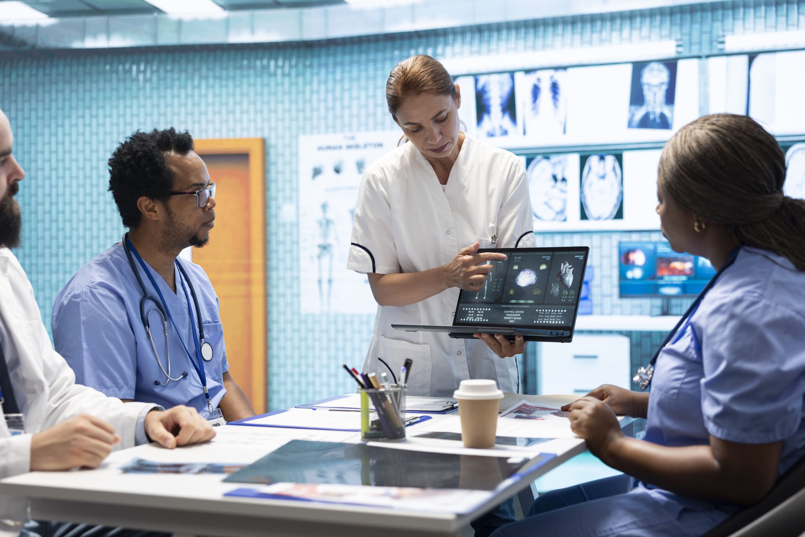 Specialists reviewing ECG results in a meeting